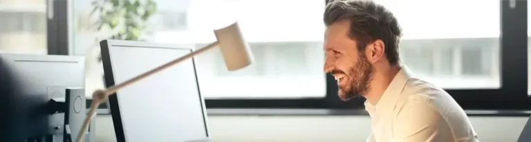 A business owner happy with the leads generated by his outsourced SDRs