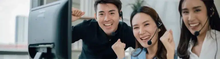 An outbound calling team celebrates a successful campaign