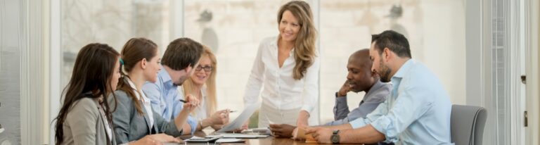 Alt text: A group meeting about how to prospect leads.