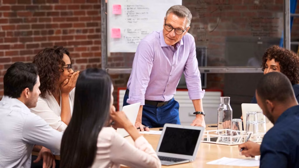 A sales team strategizing how to generate B2B leads