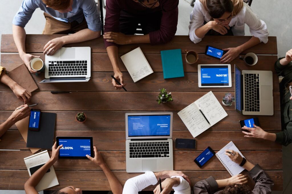 A fractional sales team collaborates to strategize for a client