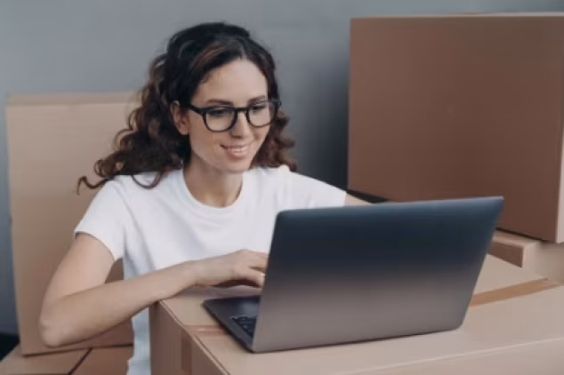 Doing SEO for moving companies on laptop.