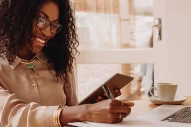 Posting on LinkedIn from a cozy home workspace.