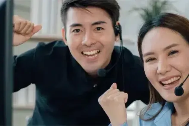 An outbound calling team celebrates a successful campaign