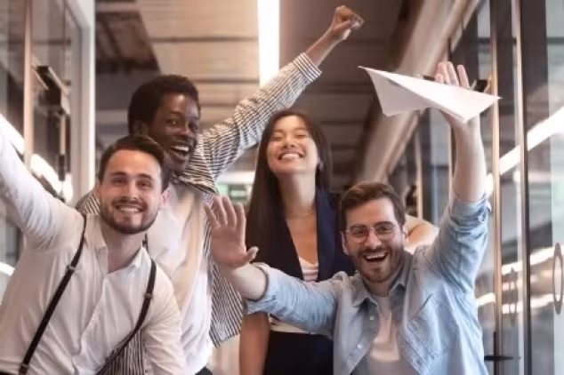 An SDR prospecting team celebrates an effective outreach campaign